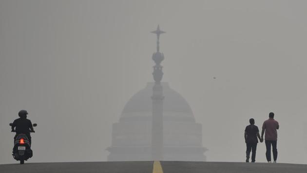 Rashtrapati Bhavan is seen at the background amid dense haze and low visibility due to rise in smog. According to officials, people in NCR will need to wait till the weather changes for any relief. “A western disturbance is approaching and this is expected to trigger some strong surface winds, which in turn would help flush out pollutants. Significant improvement is expected from Sunday onwards,” said a senior official of Safar. (Burhaan Kinu / HT Photo) Rashtrapati Bhavan is seen at the background amid dense haze and low visibility due to rise in smog. According to officials, people in NCR will need to wait till the weather changes for any relief. “A western disturbance is approaching and this is expected to trigger some strong surface winds, which in turn would help flush out pollutants. Significant improvement is expected from Sunday onwards,” said a senior official of Safar. (Burhaan Kinu / HT Photo)
