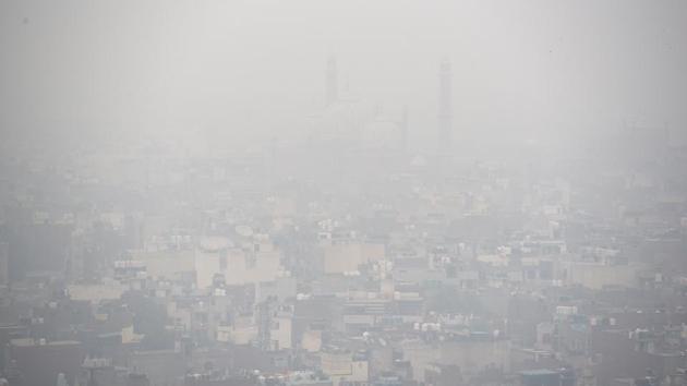 A view of the Jama Masjid covered in dense smog. Delhi, meteorologists explained, is at present trapped in a cycle of pollution that blocks out the sun, which in turn makes the day temperatures cooler — a crucial factor that again leads to pollutants being trapped in the air. Once winds help clear some pollutants, more sunshine will aid in warming and, thus, clearing away more particles. (Sanchit Khanna / HT Photo) A view of the Jama Masjid covered in dense smog. Delhi, meteorologists explained, is at present trapped in a cycle of pollution that blocks out the sun, which in turn makes the day temperatures cooler — a crucial factor that again leads to pollutants being trapped in the air. Once winds help clear some pollutants, more sunshine will aid in warming and, thus, clearing away more particles. (Sanchit Khanna / HT Photo)