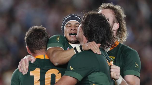 South Africa's Cheslin Kolbe celebrates scoring their second try with teammates(REUTERS)