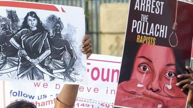 Members of various Tamil organisations hold placards and raise slogans during a protest against the Pollachi sex scandal, in Chennai(PTI Photo)