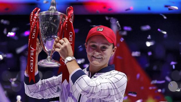 Ashleigh Barty of Australia poses with her winning trophy.(AP)