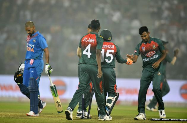 Indian batsman Shikhar Dhawan leaves the field after being dismissed. (PTI)