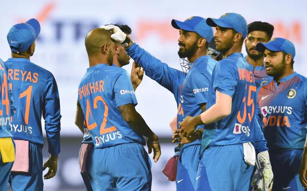 Indian cricketers celebrate the dismissal of Bangladesh's Naim Sheikh during the first T20 cricket match. (PTI)