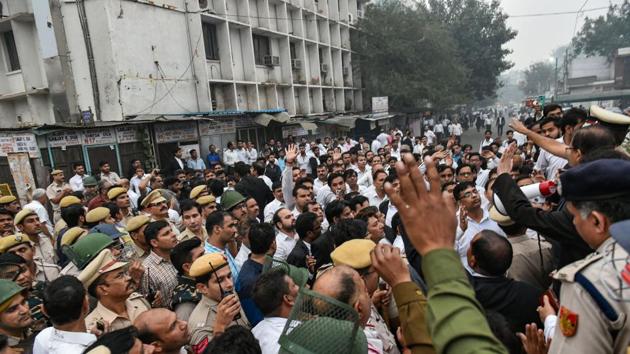 Lawyers and police personnel after clashes at Tis Hazari Court complex in New Delhi. (PTI) Lawyers and police personnel after clashes at Tis Hazari Court complex in New Delhi. (PTI)