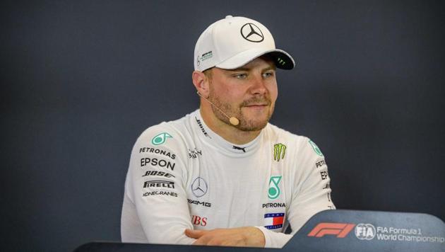 Valtteri Bottas speaks to the media after winning pole position in qualifying for the United States Grand Prix. (USA TODAY Sports) Valtteri Bottas speaks to the media after winning pole position in qualifying for the United States Grand Prix. (USA TODAY Sports)