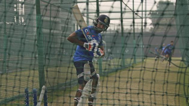 Rohit Sharma watches the ball leave as he attends net practice session. (AP) Rohit Sharma watches the ball leave as he attends net practice session. (AP)