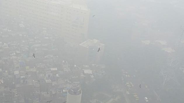 Students from universities across Delhi protest against “government’s inability” to handle the rising pollution levels in the city. (PTI) Students from universities across Delhi protest against “government’s inability” to handle the rising pollution levels in the city. (PTI)