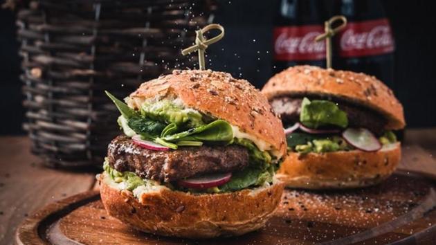 Burger aficionados in Europe have been lately consuming an increasing quantity of meat. (Representational image) (Unsplash) Burger aficionados in Europe have been lately consuming an increasing quantity of meat. (Representational image) (Unsplash)
