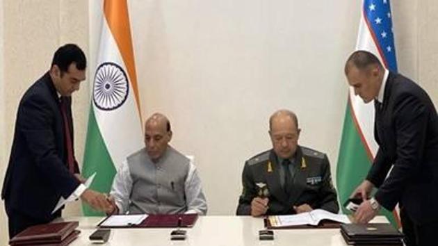 India’s Defence Minister Rajnath Singh with his Uzbekistan counterpart Major General Bakhodir Nizamovich Kurbanov. (IANS) India’s Defence Minister Rajnath Singh with his Uzbekistan counterpart Major General Bakhodir Nizamovich Kurbanov. (IANS)