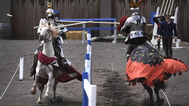 England’s Stacy van Dolah-Evans (L) jousts with Australia’s Phil Leitch (R) during the inaugural “Ashes” jousting tournament between Australia and England at the Kryal Castle in Leigh Creek, some 100 kms west of Melbourne. Australia and England took their storied sports rivalry to another level, and another century, this weekend as the two nations faced off in a jousting tournament. (William West / AFP)