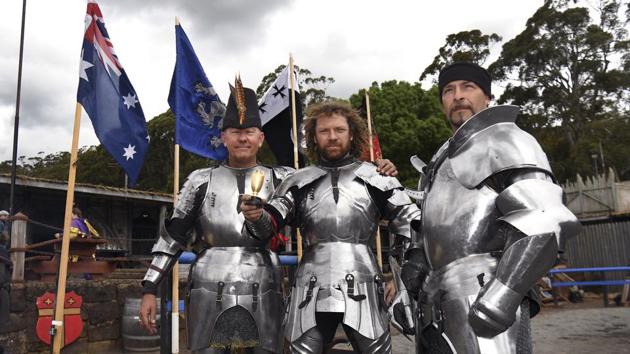 Australia’s captain Phil Leitch (C) holds the “Ashes” trophy with teammates Andrew McKinnon (L) and Clifford Marisma (R) after defeating England in the inaugural “Ashes” jousting tournament. Dubbed the “Ashes” of jousting -- a reference to the historic cricket Test matches between the two countries -- three Australian “knights” bested a trio of English counterparts over two days of competition in a small town in rural Victoria state. (William West / AFP)
