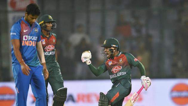 Bangladesh's Mushfiqur Rahim, celebrates after wining first T20 cricket match against India at the Arun Jaitley stadium, in New Delhi, Sunday, Nov. 3, 2019.(PTI) Bangladesh's Mushfiqur Rahim, celebrates after wining first T20 cricket match against India at the Arun Jaitley stadium, in New Delhi, Sunday, Nov. 3, 2019.(PTI)