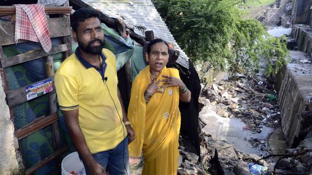 Volunteers of a citizens group interacted with residents who were affected due to heavy rains in the city recently.(Ravindra Joshi/HT PHOTO)
