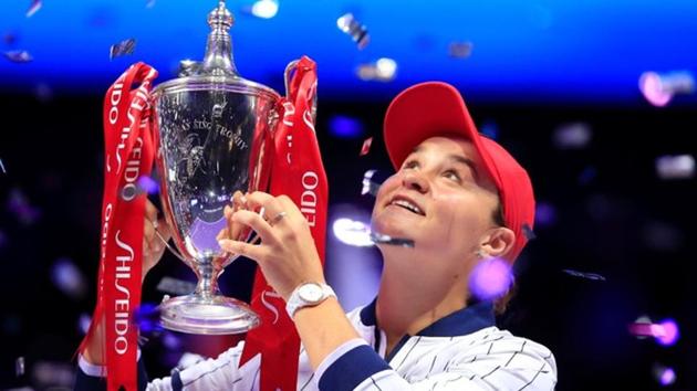 Australia's Ashleigh Barty poses with a trophy as she celebrates after winning the final against Ukraine's Elina Svitolina.(REUTERS)