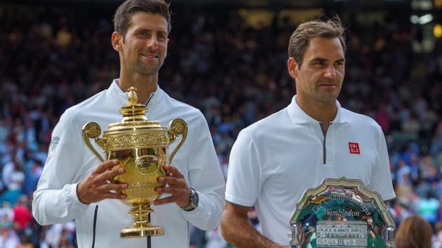 A file photo of Novak Djokovic (L) and Roger Federer. (USA TODAY Sports) A file photo of Novak Djokovic (L) and Roger Federer. (USA TODAY Sports)