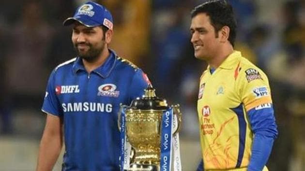 Rohit Sharma (L) and MS Dhoni pose with the IPL trophy.(PTI)