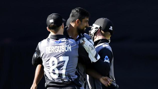 New Zealand's Ish Sodhi surrounded by teammates after dismissing England's Dawid Milan for 39. (AP) New Zealand's Ish Sodhi surrounded by teammates after dismissing England's Dawid Milan for 39. (AP)