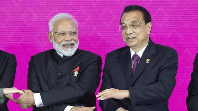 Prime Minister Narendra Modi, left, and Chinese Premier Li Keqiang pose for a group photo at The Regional Comprehensive Economic Partnership Association of Southeast Asian Nations (ASEAN) summit inThailand. (AP photo) Prime Minister Narendra Modi, left, and Chinese Premier Li Keqiang pose for a group photo at The Regional Comprehensive Economic Partnership Association of Southeast Asian Nations (ASEAN) summit inThailand. (AP photo)