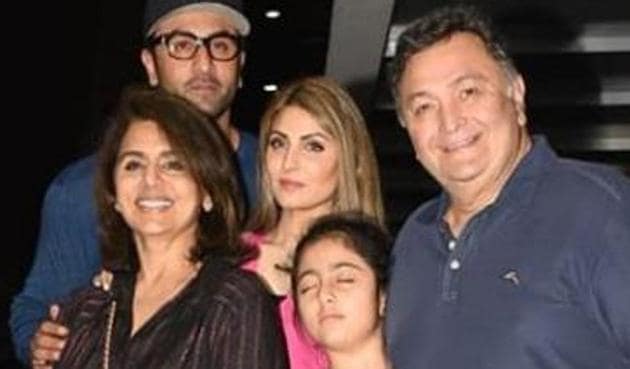 Rishi Kapoor poses with family as he stepped out for dinner.