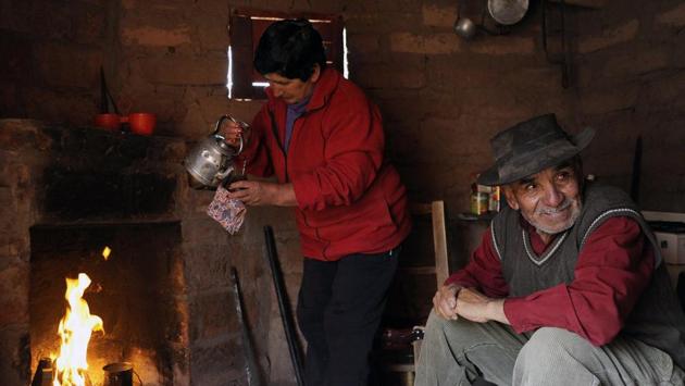 “The situation has changed a lot here. It’s not what it was two years ago, when the winter was good, with more snowfall,” 68-year-old Antonio Sazo said, sitting inside his wood and adobe traditional house. With his wife and three of his children, he ekes out a living from a herd of 300 goats in Arro Ponigue, 350 kilometers (220 miles) south of Argentina’s lush wine capital Mendoza. (Andres Larrovere / AFP) “The situation has changed a lot here. It’s not what it was two years ago, when the winter was good, with more snowfall,” 68-year-old Antonio Sazo said, sitting inside his wood and adobe traditional house. With his wife and three of his children, he ekes out a living from a herd of 300 goats in Arro Ponigue, 350 kilometers (220 miles) south of Argentina’s lush wine capital Mendoza. (Andres Larrovere / AFP)