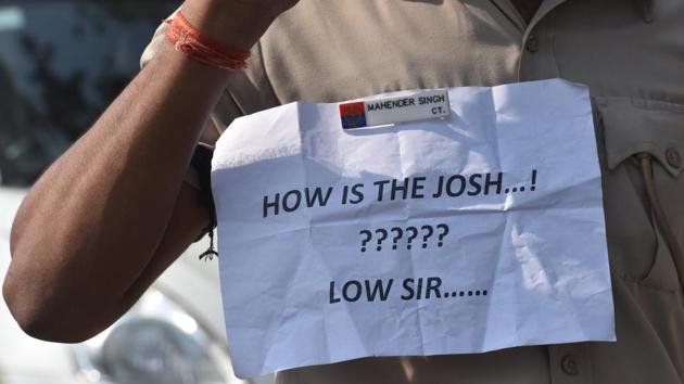 “How is the Josh? Low, Sir,” read the slogan on one placard, a take-off on a dialogue in the movie Uri, based on the 2016 surgical strikes carried out by Indian soldiers across the Line of Control in Pakistan. The answer in the movie is “high, sir.” “We are human in police uniforms”, “We are not punching bags” and “Protectors Need Protection,” read some of the other slogans. (Sanchit Khanna / HT Photo)