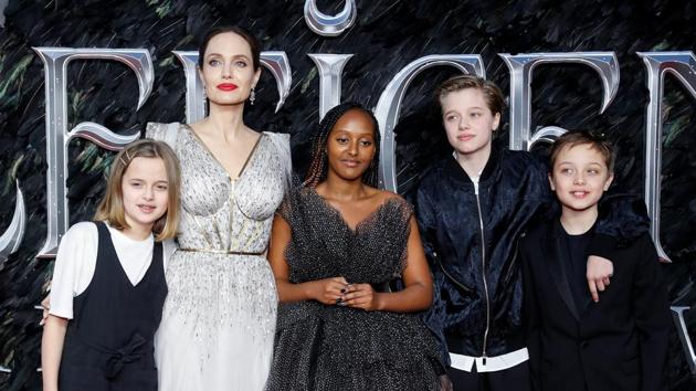 Actor Angelina Jolie, accompanied by her kids, poses as she attends the UK premiere of Maleficent: Mistress of Evil in London, Britain.(REUTERS)