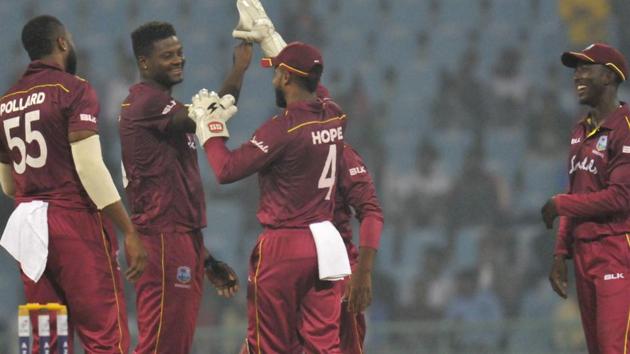 West Indies players celebrate after defeating Afghanistan.(PTI)
