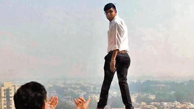 At around 10.30 am on Wednesday, a young advocate climbed up to the terrace of a 15-storey tall building. He threatened to jump to his death. At around 10.30 am on Wednesday, a young advocate climbed up to the terrace of a 15-storey tall building. He threatened to jump to his death.