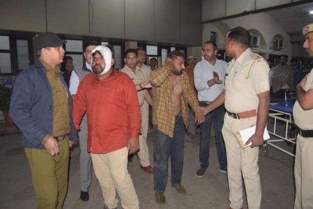 Two of the accused in police custody in Panchkula on Thursday. (HT Photo) Two of the accused in police custody in Panchkula on Thursday. (HT Photo)
