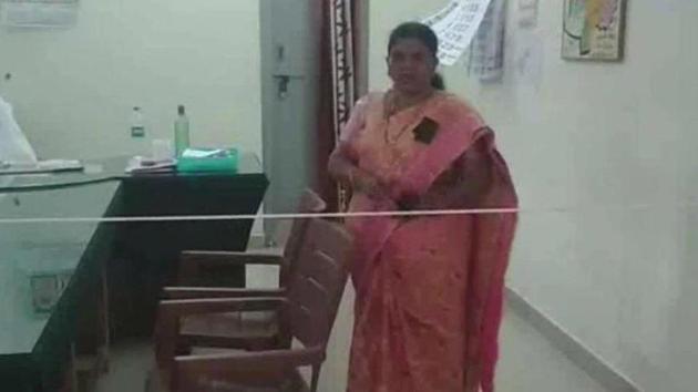 Following suggestions from fellow revenue officials in the district, Umamaheshwari later removed the rope. (ANI photo) Following suggestions from fellow revenue officials in the district, Umamaheshwari later removed the rope. (ANI photo)