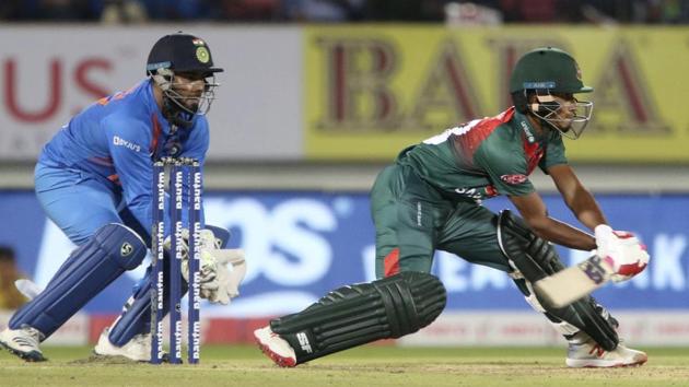 Bangladesh's Afif Hossain prepares to play a reverse shot. (AP)