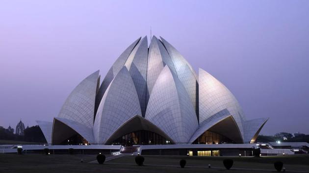 A view of the Bahai House of Worship popularly known as the Lotus Temple on a day with clear skies, at Kalkaji in New Delhi. Parts of Delhi and Haryana received light rain on Thursday morning even as the national capital’s air quality climbed up to be in the ‘poor’ zone from ‘very poor’. (Biplov Bhuyan / HT Photo)
