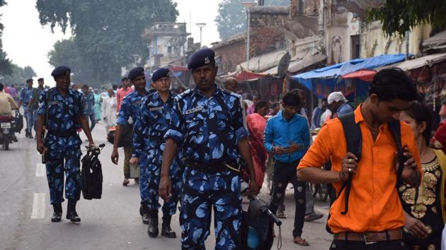 Rapid Action Force (RPF) and Uttar Pradesh Police personnel patrol a street in Ayodhya on November 6, 2019 (AFP) Rapid Action Force (RPF) and Uttar Pradesh Police personnel patrol a street in Ayodhya on November 6, 2019 (AFP)