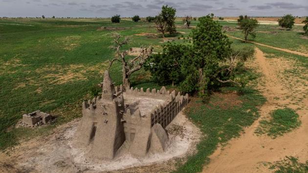 The herders’ prominent role in the jihadist revolt has ignited long-standing rivalries, based on access to land, with farmer groups. The conflict has turned a once-peaceful tourist region into a no-go area for visitors, its highways sown with roadside bombs, and swathes of the countryside are littered with abandoned burned-out villages. (Marco Longari / AFP)