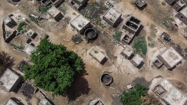 A view of the destroyed Fulani village of Bare, near Sadia Peulh. Today the world’s attention has turned to this ancient herding community as many of its members have been ensnared in a deadly jihadist insurgency spreading from Mali’s restive north to its centre. (Marco Longari / AFP)