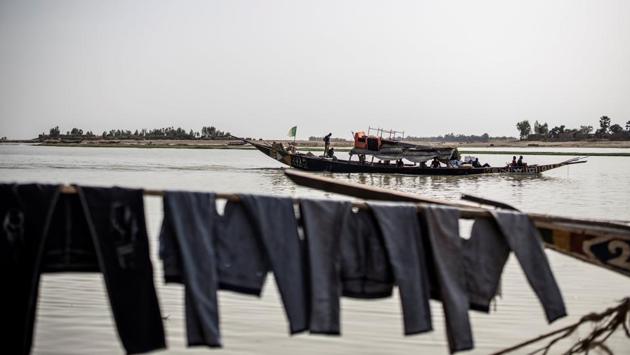 Laundry left to dry on the banks of the Niger river in Mopti, in central Mali’s Dogon region. Not too many years ago, well-heeled foreign visitors flocked to the so-called Venice of Mali. Today, Mopti finds itself surrounded by a sea of conflict and criminality that has left thousands of dead. According to UN figures, as many as 70,000 people in the region have fled their homes. (Marco Longari / AFP)