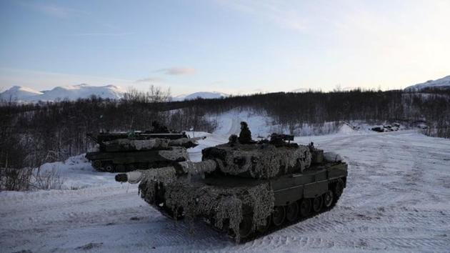 A soldier from the Second Tank Squadron of the First Battalion of the Northern Brigade of the Norwegian Army looks out from the top of a tank during “Reindeer 2”, a Norwegian-U.S. military drill in Setermoen. “Do not use your GPSes. They may be jammed,” Croak barks to the Marines, a warning stemming from NATO accusations - denied by Russia - that Moscow has in the past jammed GPS systems in Norway. (Stoyan Nenov / REUTERS) A soldier from the Second Tank Squadron of the First Battalion of the Northern Brigade of the Norwegian Army looks out from the top of a tank during “Reindeer 2”, a Norwegian-U.S. military drill in Setermoen. “Do not use your GPSes. They may be jammed,” Croak barks to the Marines, a warning stemming from NATO accusations - denied by Russia - that Moscow has in the past jammed GPS systems in Norway. (Stoyan Nenov / REUTERS)