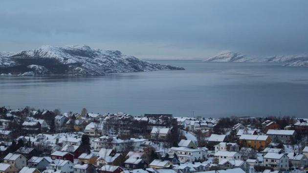A view of houses surrounding landscape of Kirkenes. The rising tension is unsettling many Norwegians, not least in the town of Kirkenes, which for three decades has been trying to foster cooperation with Russia. Residents can cross the nearby border quickly with a visa-free permit. Many go to the nearby Russian town of Nikel to buy petrol because it is much cheaper there, and street signs use both the Cyrillic and Latin scripts. (Maxim Shemetov / REUTERS) A view of houses surrounding landscape of Kirkenes. The rising tension is unsettling many Norwegians, not least in the town of Kirkenes, which for three decades has been trying to foster cooperation with Russia. Residents can cross the nearby border quickly with a visa-free permit. Many go to the nearby Russian town of Nikel to buy petrol because it is much cheaper there, and street signs use both the Cyrillic and Latin scripts. (Maxim Shemetov / REUTERS)