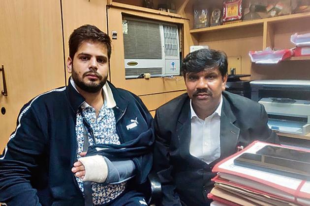 Sagar Sharma (left) with his boss Lalit Sharma at Tis Hazari court, New Delhi. Sagar says he is being painted a ‘villain’ in the incident involving clashes between lawyers and Delhi Police. (HT Photo) Sagar Sharma (left) with his boss Lalit Sharma at Tis Hazari court, New Delhi. Sagar says he is being painted a ‘villain’ in the incident involving clashes between lawyers and Delhi Police. (HT Photo)