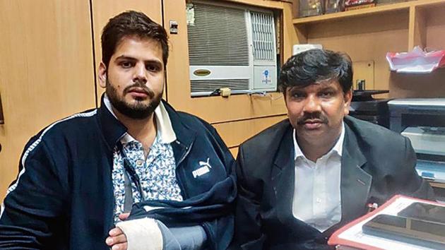 Sagar Sharma (left) with his boss Lalit Sharma at Tis Hazari court, New Delhi. Sagar says he is being painted a ‘villain’ in the incident involving clashes between lawyers and Delhi Police. (HT Photo) Sagar Sharma (left) with his boss Lalit Sharma at Tis Hazari court, New Delhi. Sagar says he is being painted a ‘villain’ in the incident involving clashes between lawyers and Delhi Police. (HT Photo)