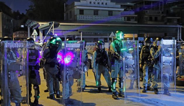 China has slammed radical protesters in Hong Kong as “mobsters” using violence to influence upcoming local elections, after a pro-Beijing lawmaker was injured in a stabbing. (AP) China has slammed radical protesters in Hong Kong as “mobsters” using violence to influence upcoming local elections, after a pro-Beijing lawmaker was injured in a stabbing. (AP)