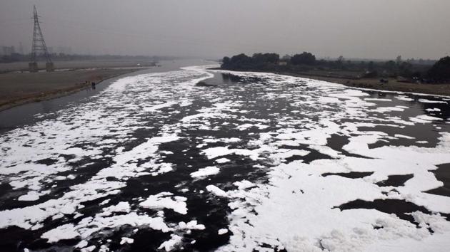 A view of the Yamuna river with toxic foam, at Kalindi Kunj. Post Diwali, the national capital and its adjoining regions have been experiencing a severe pollution crisis. The situation has become so grave that not only the air, even the water bodies situated in Delhi such as the Yamuna river near Kalindi Kunj area have become completely toxic. (Mohd Zakir / HT Photo)