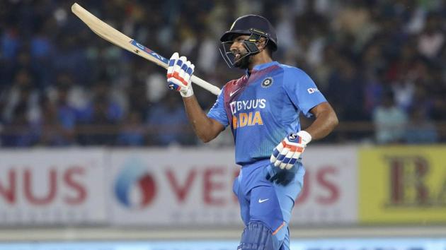 Rohit Sharma reacts after missing a ball.(AP)