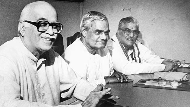 AB Vajpayee (C), Murli Manohar Joshi (R) and LK Advani at a party National Executive Committee meeting. BJP president Advani in 1990 went on a Somnath-to-Ayodhya Rath Yatra to ‘educate people’ about the movement to build a temple at the site. In 1991, BJP became the primary opposition party and came to power in Uttar Pradesh. The momentum for the temple movement increased as kar sevaks (volunteers) poured into Ayodhya. (HT Archive)