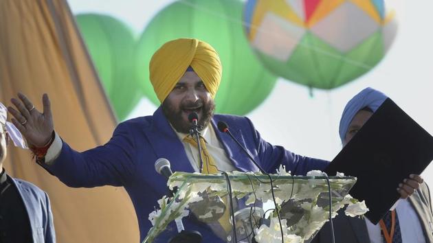 Indian cricketer turned politician Navjote Singh Sidh addresses the gathering during the inauguration ceremony of Gurdwara Darbar Sahib. Cricketer-turned-politician Sidhu regaled the crowds across the border in Kartarpur on Saturday with his urdu couplets as he thanked his ‘yaar dildaar’ Pakistan prime minister Imran Khan for making history and fulfilling the dream of four generations of Sikhs. (KM Chaudary / AP) 