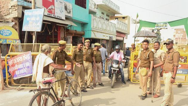 Police personnel conduct searches near the site of disputed Ram Janambhoomi-Babri Masjid site, in Ayodhya, Friday, Nov. 8, 2019. (PTI) Police personnel conduct searches near the site of disputed Ram Janambhoomi-Babri Masjid site, in Ayodhya, Friday, Nov. 8, 2019. (PTI)
