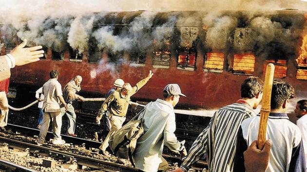 In 2002, under pressure from VHP, the Centre filed an application in the Supreme Court for vacating the ‘interim order’ banning any religious activity in Ayodhya. On February 6, 2002 at least 59 people were killed when a train in Godhra, Gujarat carrying kar sevaks from Ayodhya was attacked. As a result, riots erupted across Gujarat in which over 1,000 people were killed. (AP File)