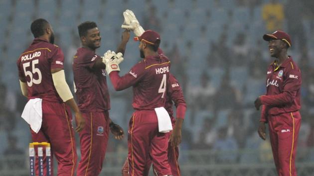 West Indies players celebrate after defeating Afghanistan during their 1st ODI cricket match at Ekana International cricket stadium, Lucknow. (PTI) West Indies players celebrate after defeating Afghanistan during their 1st ODI cricket match at Ekana International cricket stadium, Lucknow. (PTI)
