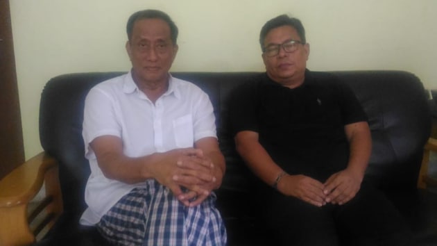 Manipur rebel leader Rajkumar Meghen (in white shirt) with his lawyer after his release from prison. (Sourced) Manipur rebel leader Rajkumar Meghen (in white shirt) with his lawyer after his release from prison. (Sourced)