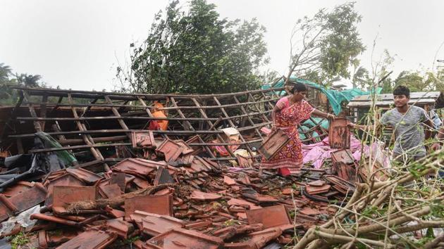 A woman stands on the remnants of her house in the aftermath of cyclone 'Bulbul', at Bakkhali, in South 24 Parganas district of West Bengal, Sunday, Nov. 10, 2019(PTI)